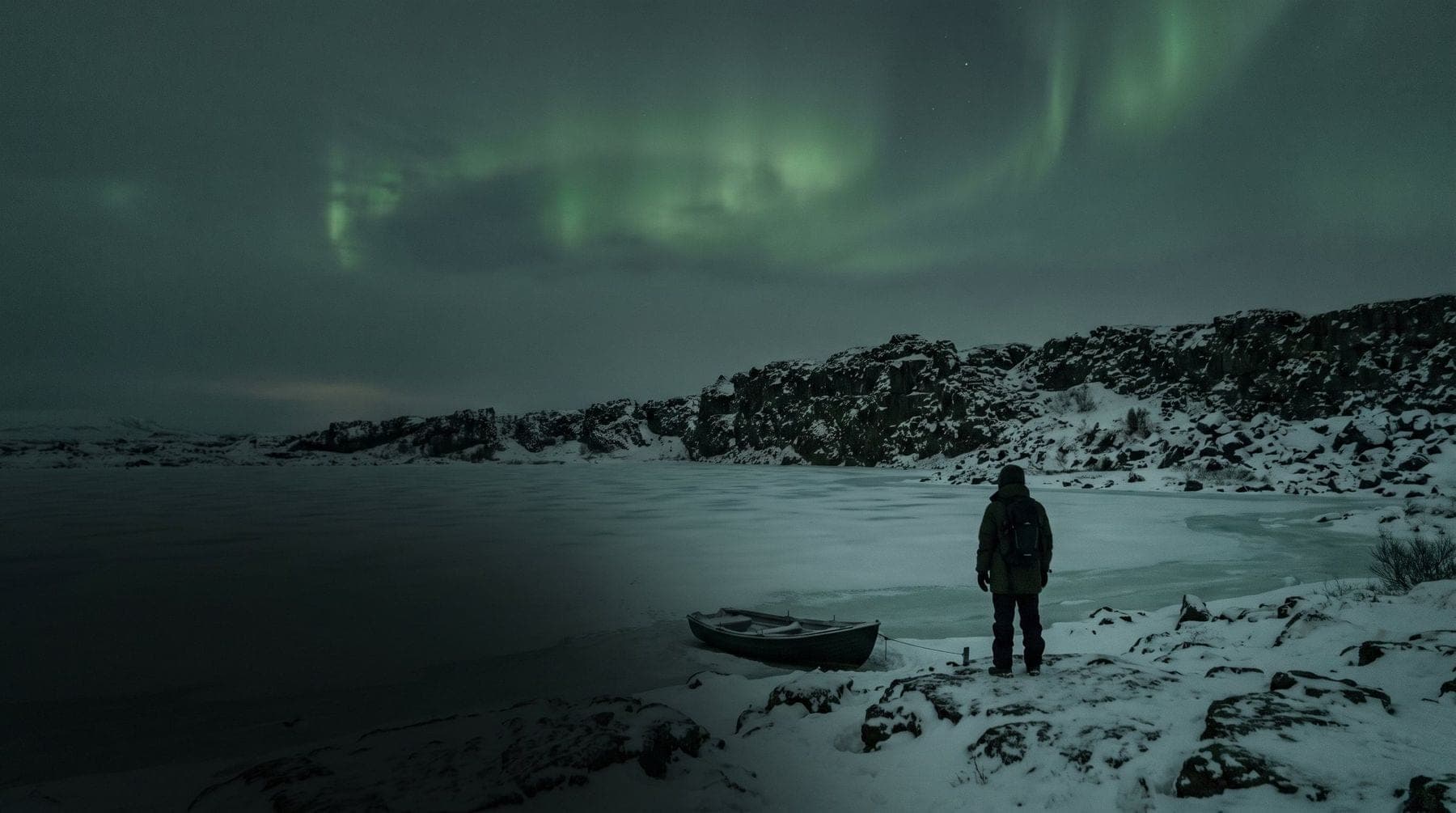 Northern lights over the lava plain at Thingvellir, Iceland