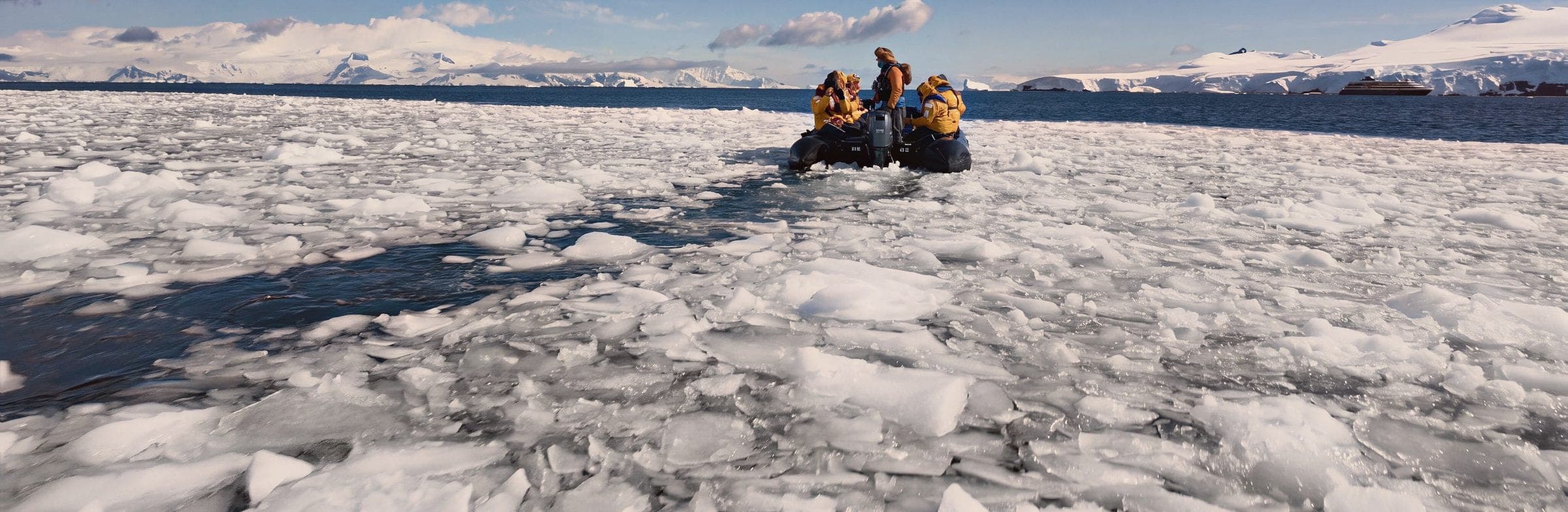 A Zodiac moving through brash ice in Antarctica