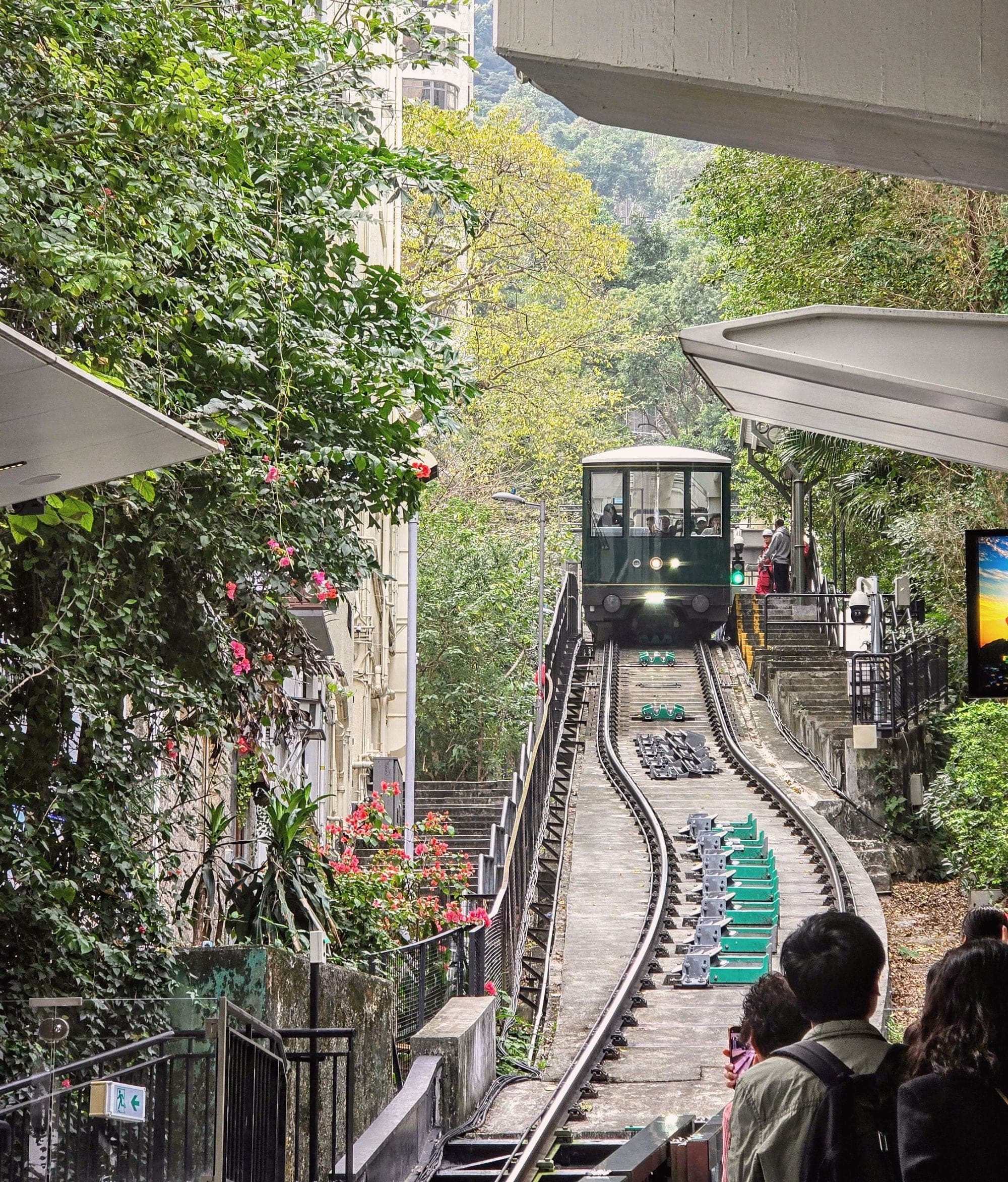 The Peak Tram climbing the steep track up Victoria Peak, Hong Kong