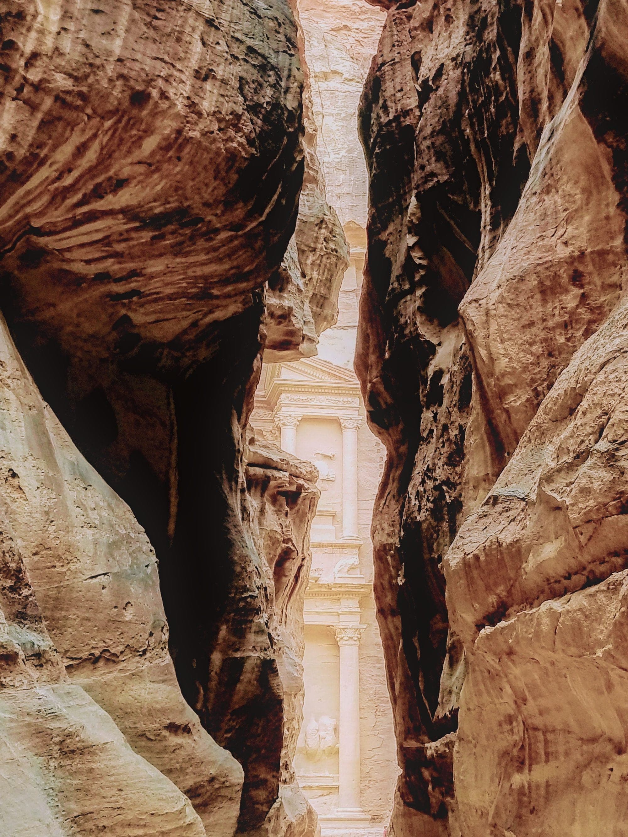 The Treasury seen through the narrow walls of the Siq
