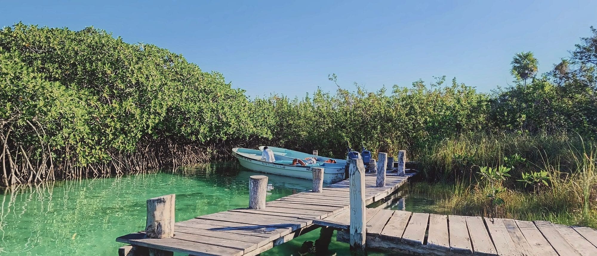 Boats at the dock in the Sian Ka'an Biosphere Reserve, Mexico